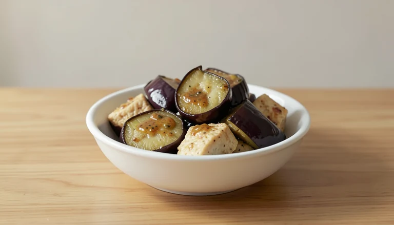 AI illustration of Illustration of cooked eggplant and tofu in sauce.